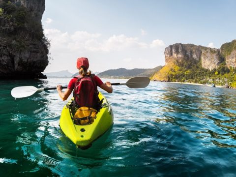 Health Benefits of Kayaking woman kayaking